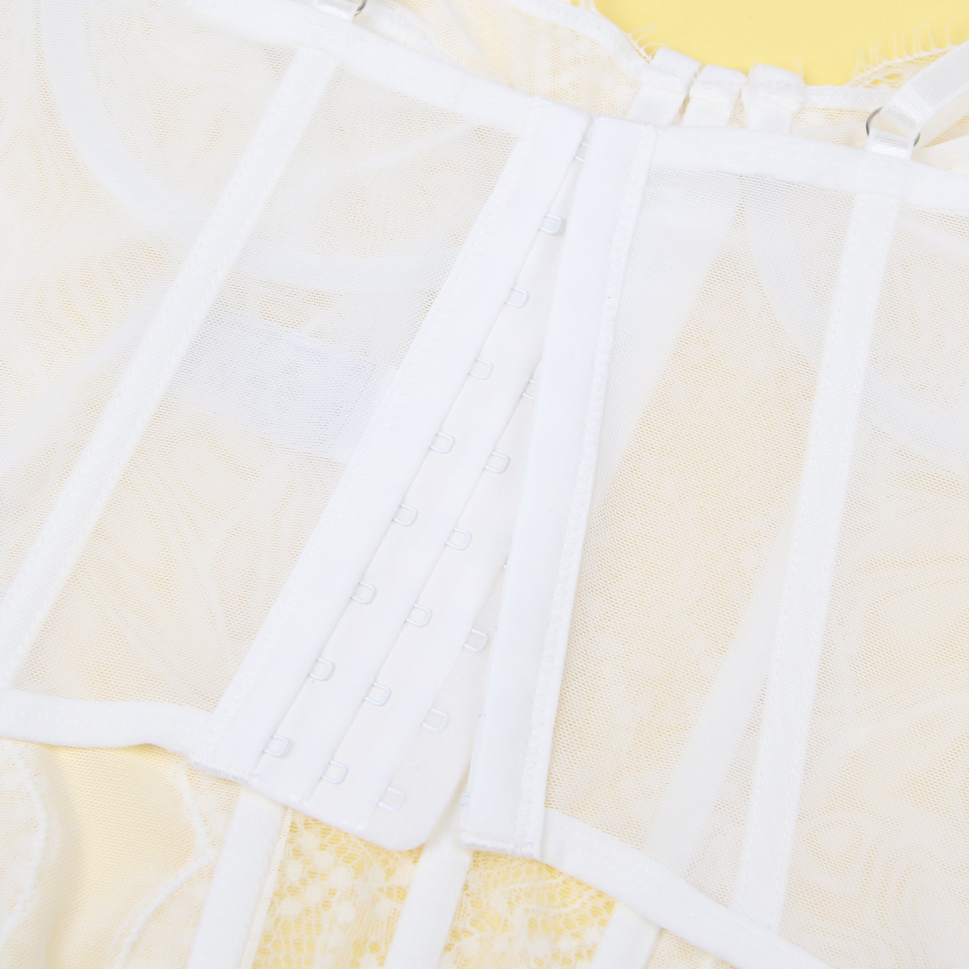 Weißes, sexy Spitzen-Strumpfhalter-BH-Top mit 9 Stäben