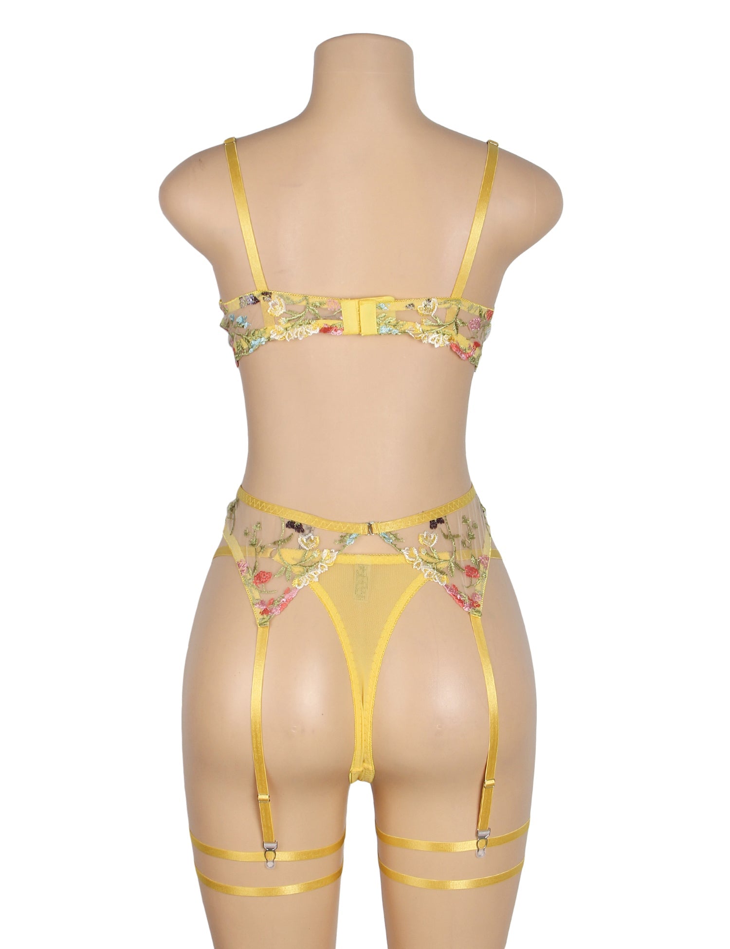 Gelbes, sexy BH-Set aus Mesh-Stickerei mit floraler Spitze und passenden Strumpfhaltern.